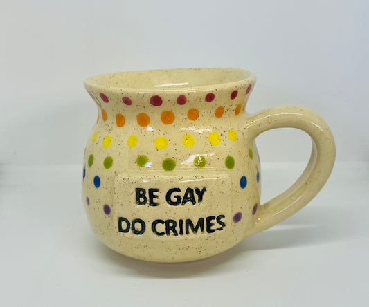A colorful ceramic mug with a bold and empowering message for LGBTQ+ individuals and allies.